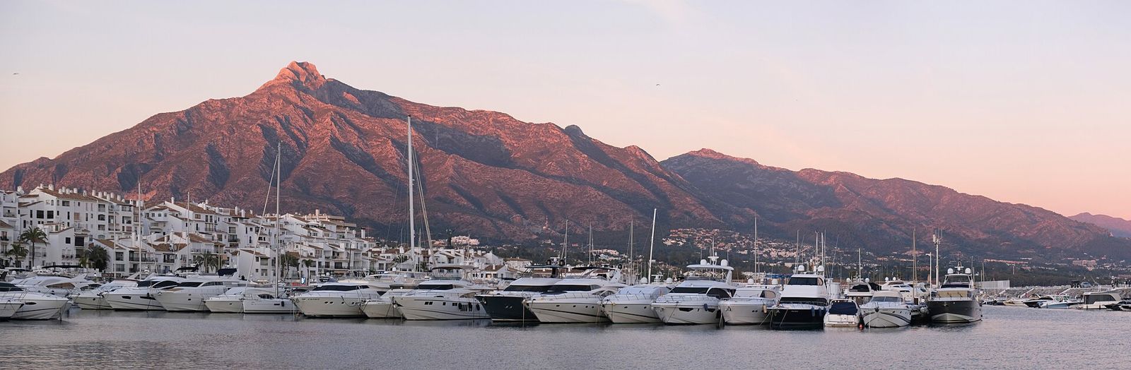 Yachts in Puerto Banús marina with Sierra Blanca behind