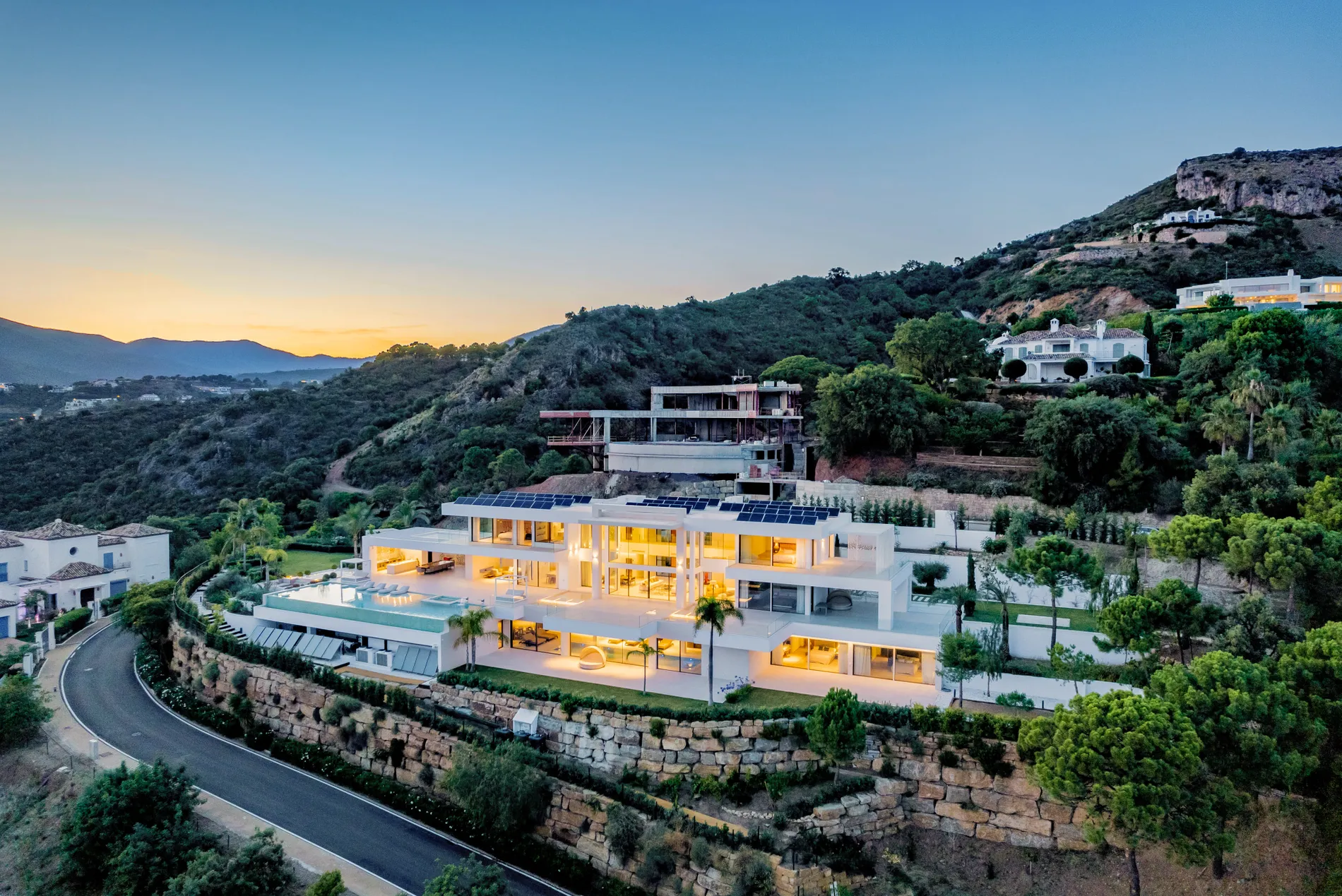 Modern villa at dusk in Marbella Club Golf Resort, Benahavís